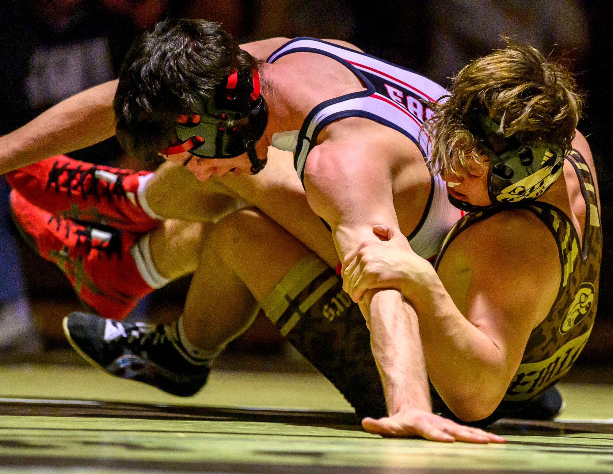 Bethlehem Catholic's Nico Emili wrestles Easton's Tanner Milburn in the 121-pound weight class Wednesday, Dec.17, 2025, in Bethlehem. (April Gamiz/The Morning Call)