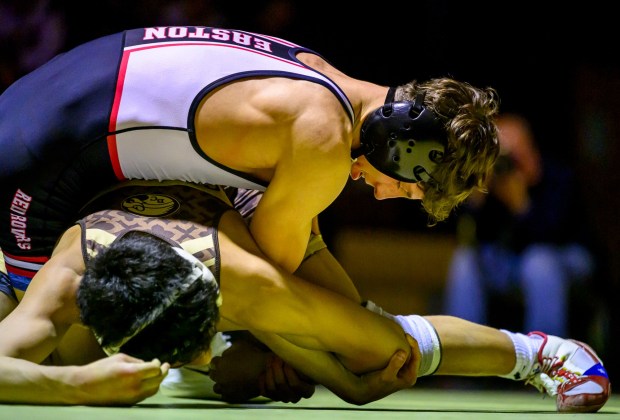 Bethlehem Catholic's A.J. Gomez wrestles Easton's Jack Famularo in the 127-pound weight class Wednesday, Dec.17, 2025, in Bethlehem. (April Gamiz/The Morning Call)