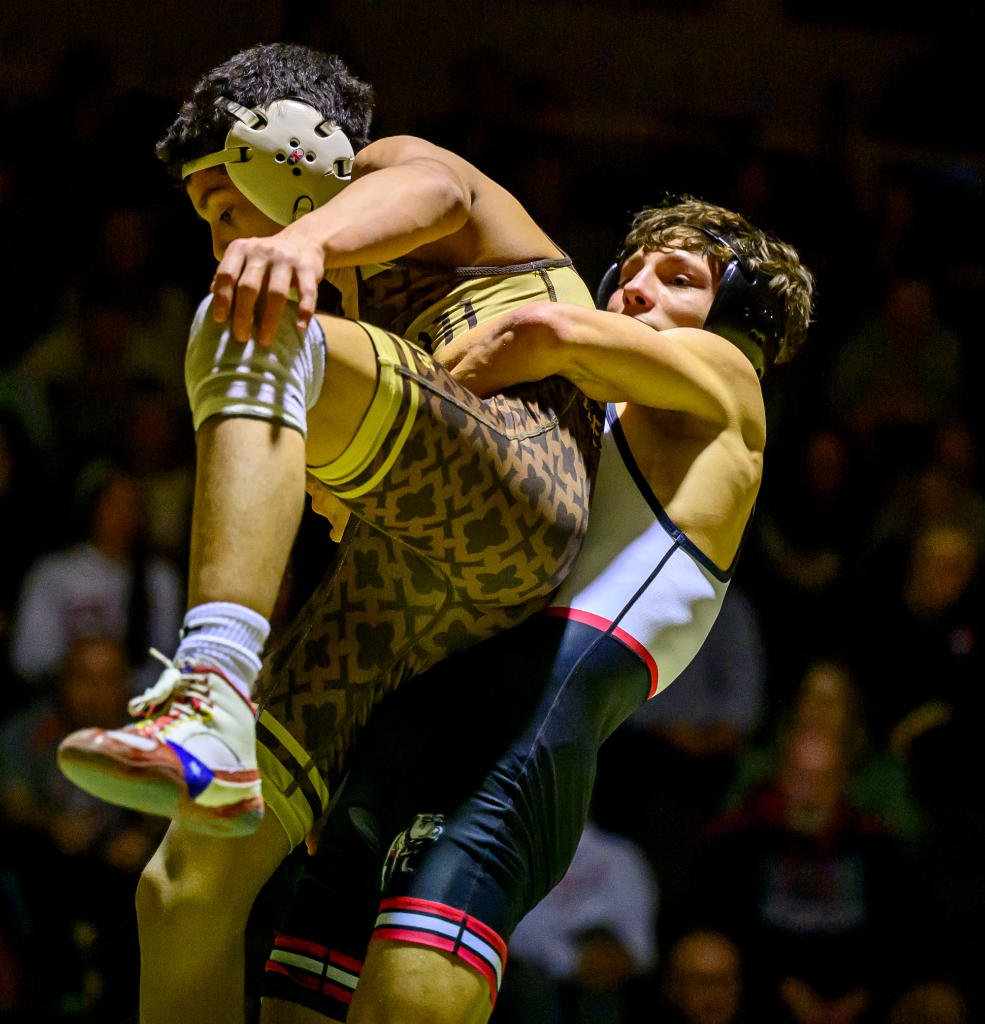 Bethlehem Catholic's A.J. Gomez wrestles Easton's Jack Famularo in the 127-pound weight class Wednesday, Dec.17, 2025, in Bethlehem. (April Gamiz/The Morning Call)