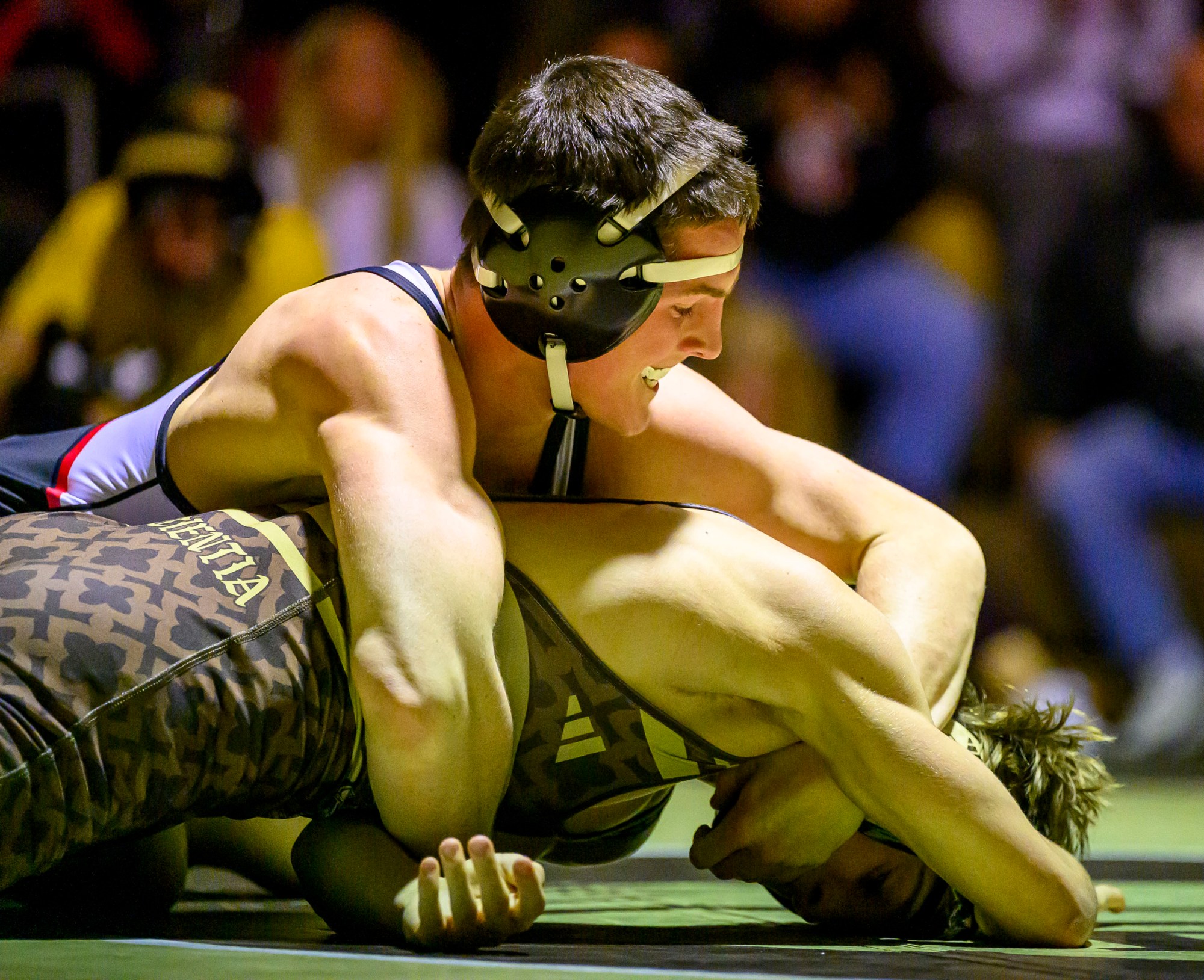 Bethlehem Catholic's Jack Cole wrestles Easton's Nick Salamone in the 133-pound weight class Wednesday, Dec.17, 2025, in Bethlehem. (April Gamiz/The Morning Call)