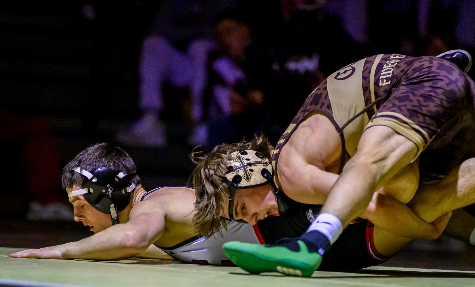 Bethlehem Catholic's Jack Cole wrestles Easton's Nick Salamone in the 133-pound weight class Wednesday, Dec.17, 2025, in Bethlehem. (April Gamiz/The Morning Call)