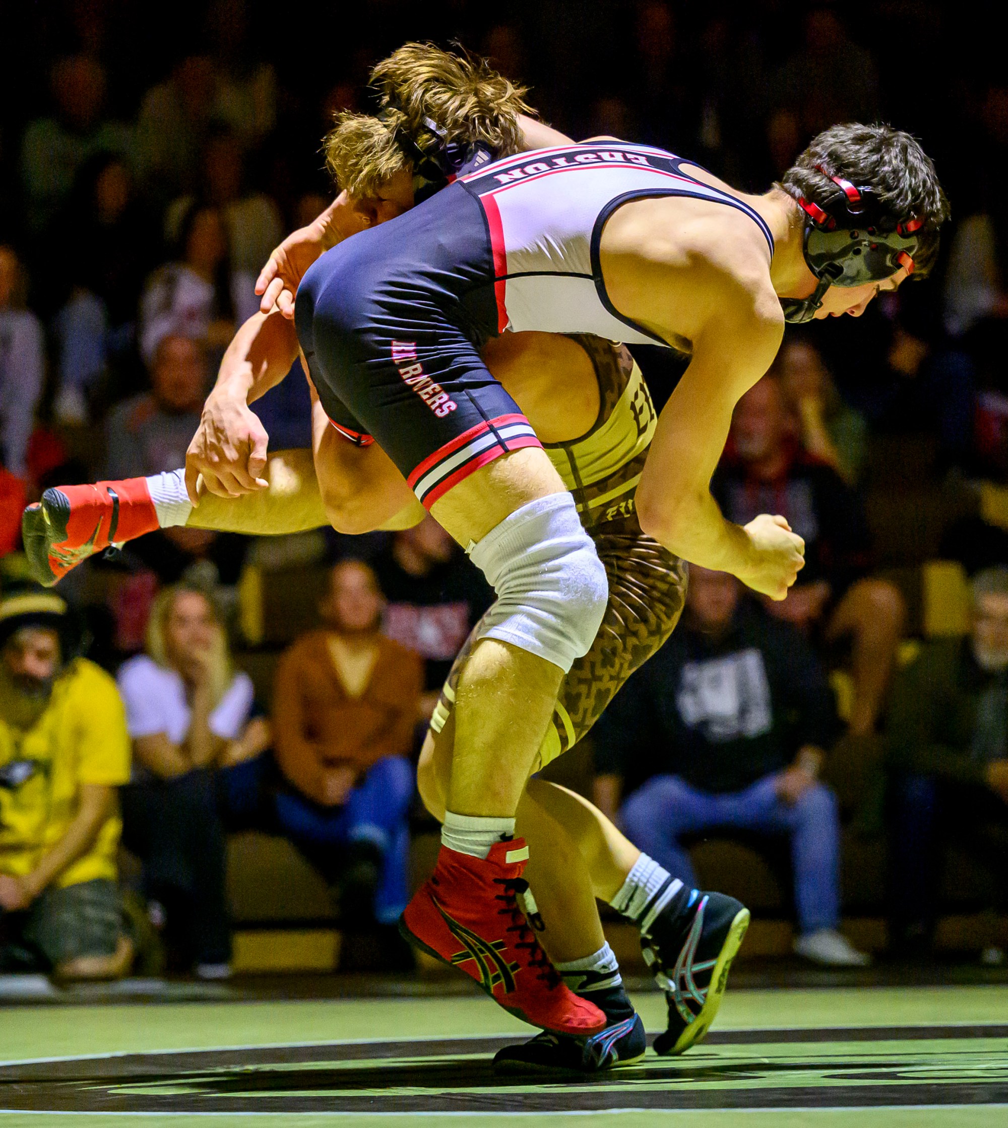 Bethlehem Catholic's Nico Emili wrestles Easton's Tanner Milburn in the 121-pound weight class Wednesday, Dec.17, 2025, in Bethlehem. (April Gamiz/The Morning Call)