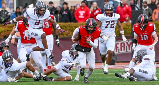Easton's quarterback Cole Ordway runs the ball down the field Thursday, Nov. 27, 2025, against Phillipsburg during the 118th annual Easton-Phillipsburg Thanksgiving football game at Fisher Stadium at Lafayette College in Easton. (April Gamiz/The Morning Call)