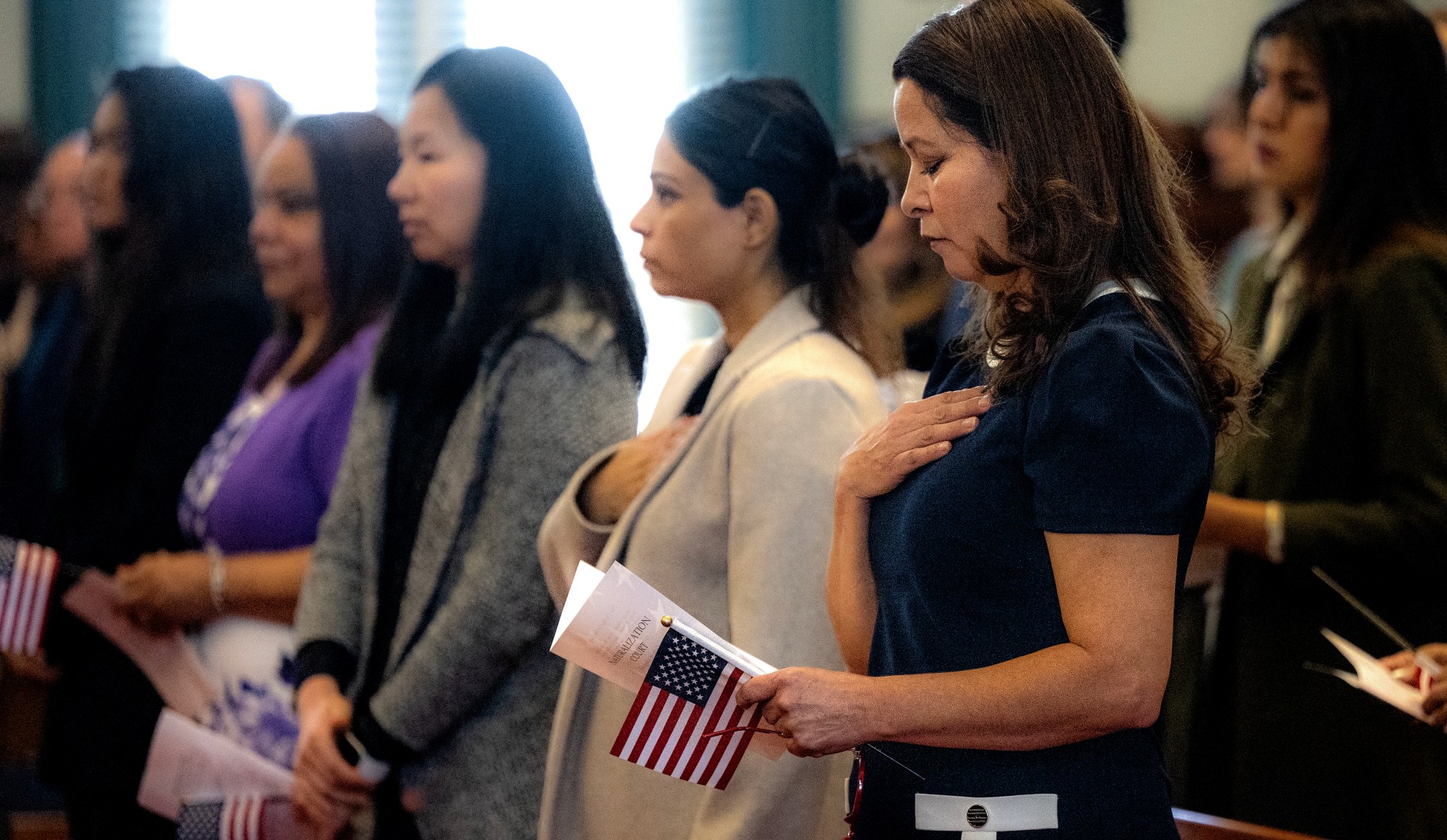 Twenty-nine people born in 18 different countries were naturalized to become American citizens Friday, March 21, 2025, at the Northampton County Courthouse in Easton. As a group they pledged an oath of allegiance to their new country. (Monica Cabrera/The Morning Call)