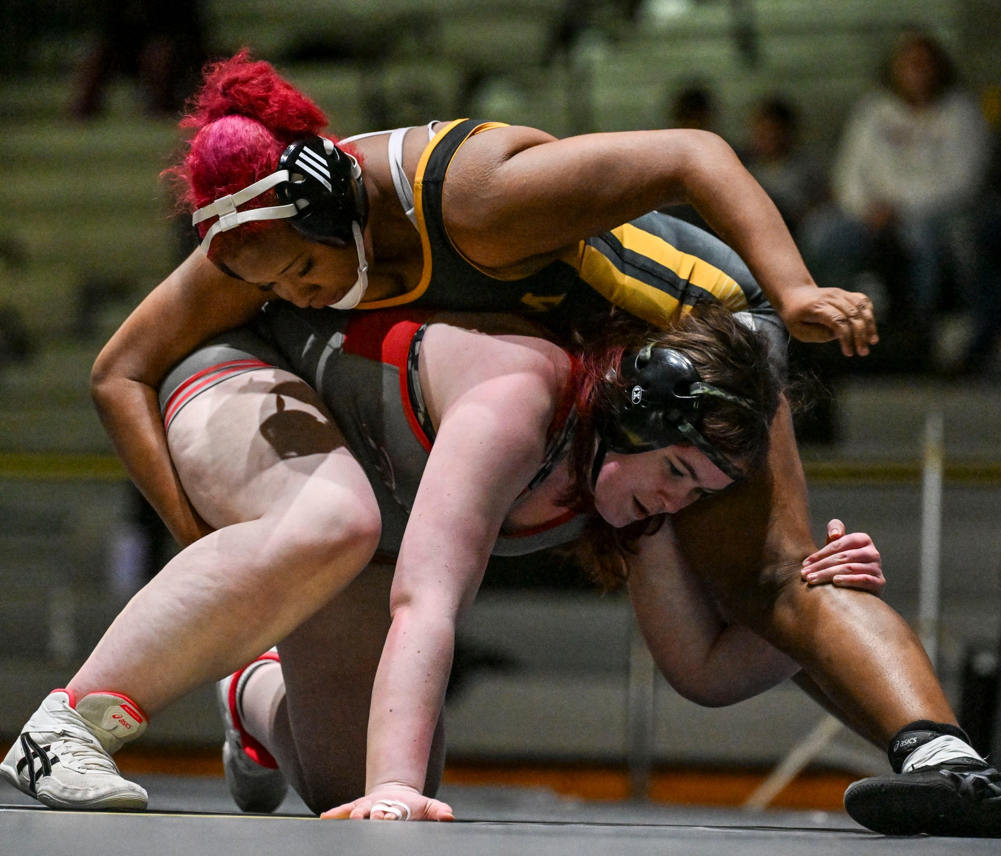 Parkland's Chloe Grady wrestles Freedom's Mikayla Hopson in the 170-pound weight class Wednesday, Jan. 22, 2025, during a girls wrestling match at Freedom High School. (April Gamiz/The Morning Call)