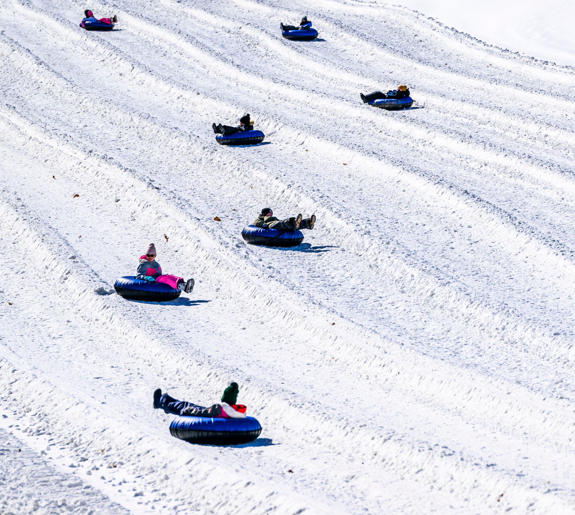 People enjoy snow tubing on the slopes Sunday, March 2, 2025, at Bear Creek Mountain Resort in Longswamp Township.(April Gamiz/The Morning Call)