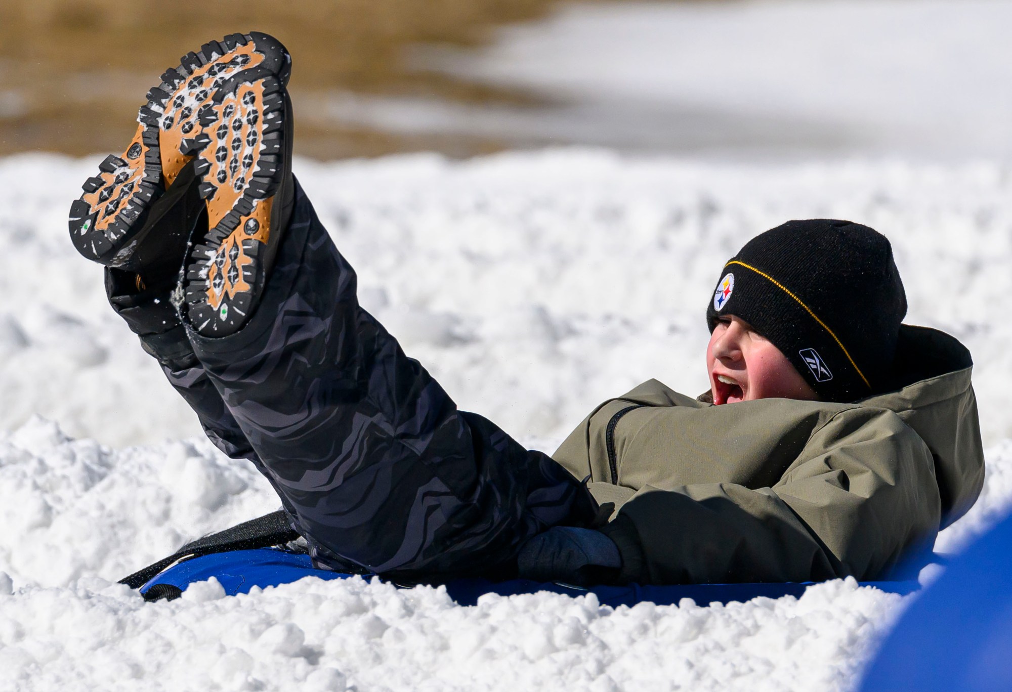 Marshall, 10, enjoys snow tubing on the slopes Sunday, March 2, 2025, at Bear Creek Mountain Resort in Longswamp Township.(April Gamiz/The Morning Call)