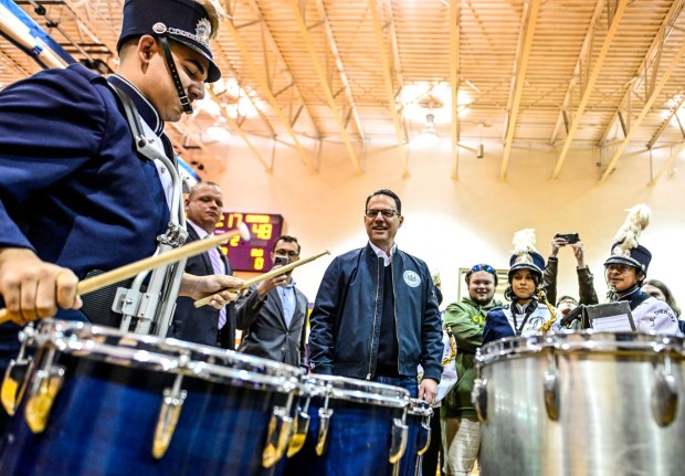 Gov. Josh Shapiro interacts Friday, Jan. 17, 2025, with the Dieruff High School Band as he and local leaders visit Harrison-Morton Middle School in Allentown to highlight the more than $2 billion in funding the Shapiro administration secured over the last two years for Pennsylvania's students, teachers and schools. (Monica Cabrera/The Morning Call)