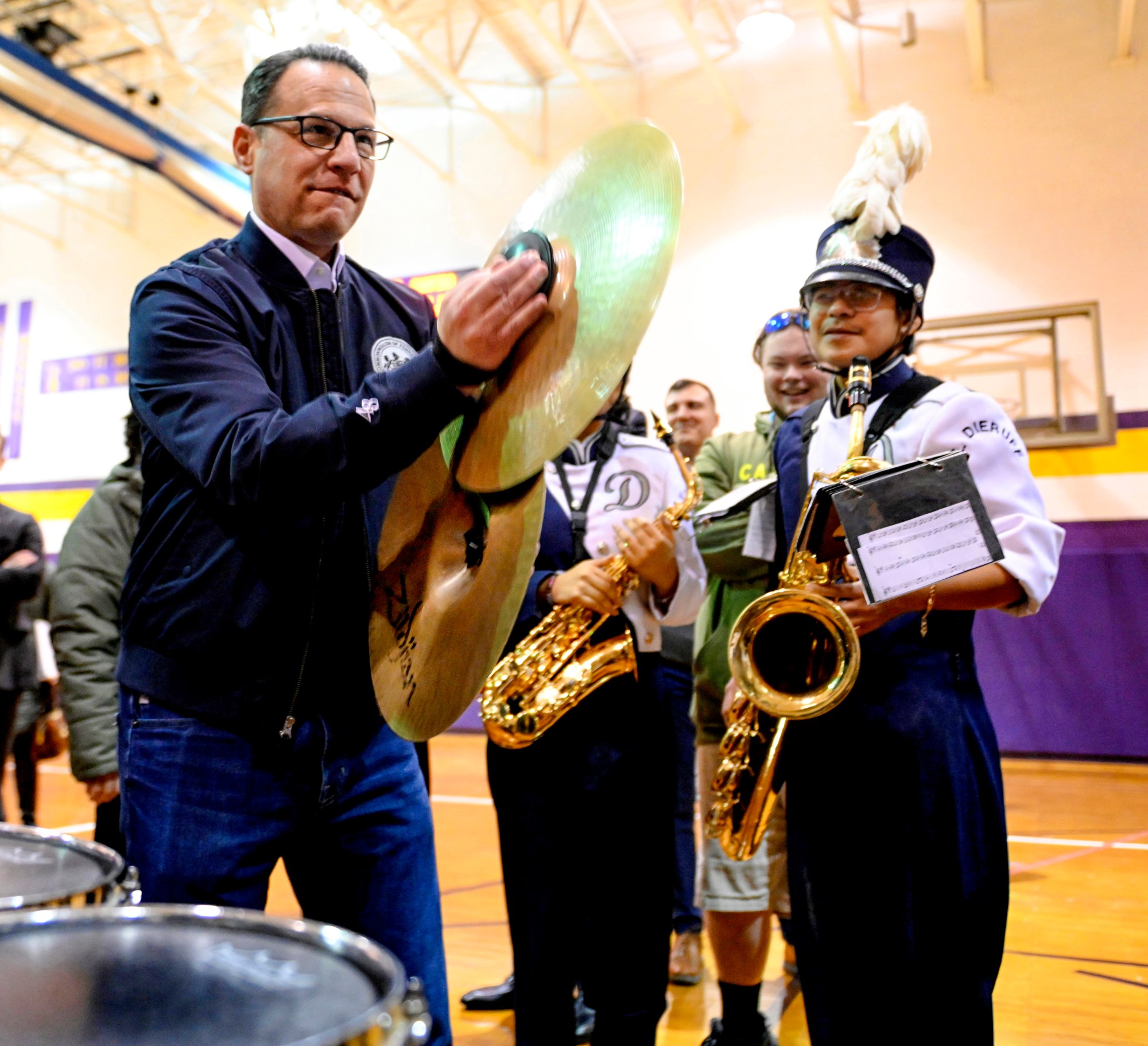 Gov. Josh Shapiro interacts Friday, Jan. 17, 2025, with the Dieruff High School Band as he and local leaders visit Harrison-Morton Middle School in Allentown to highlight the more than $2 billion in funding the Shapiro administration secured over the last two years for Pennsylvania's students, teachers and schools. (Monica Cabrera/The Morning Call)