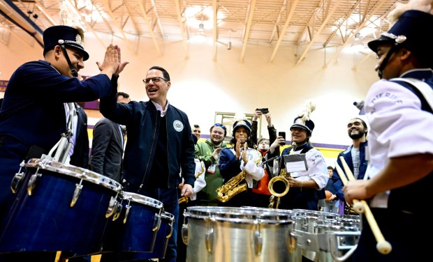 Gov. Josh Shapiro interacts Friday, Jan. 17, 2025, with the Dieruff High School Band as he and local leaders visit Harrison-Morton Middle School in Allentown to highlight the more than $2 billion in funding the Shapiro administration secured over the last two years for Pennsylvania's students, teachers and schools. (Monica Cabrera/The Morning Call)