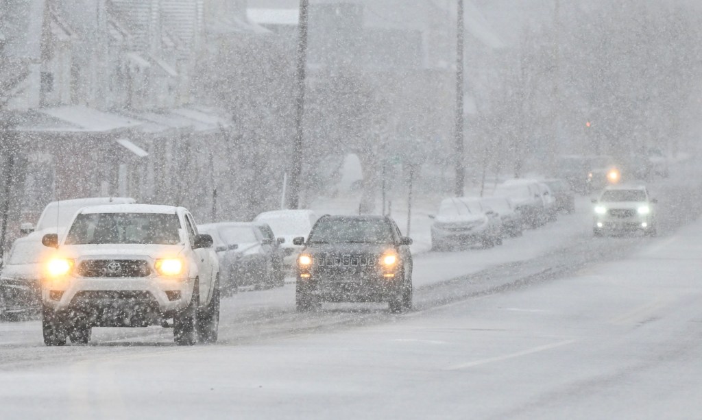 Snow totals drop, winter storm watch remains