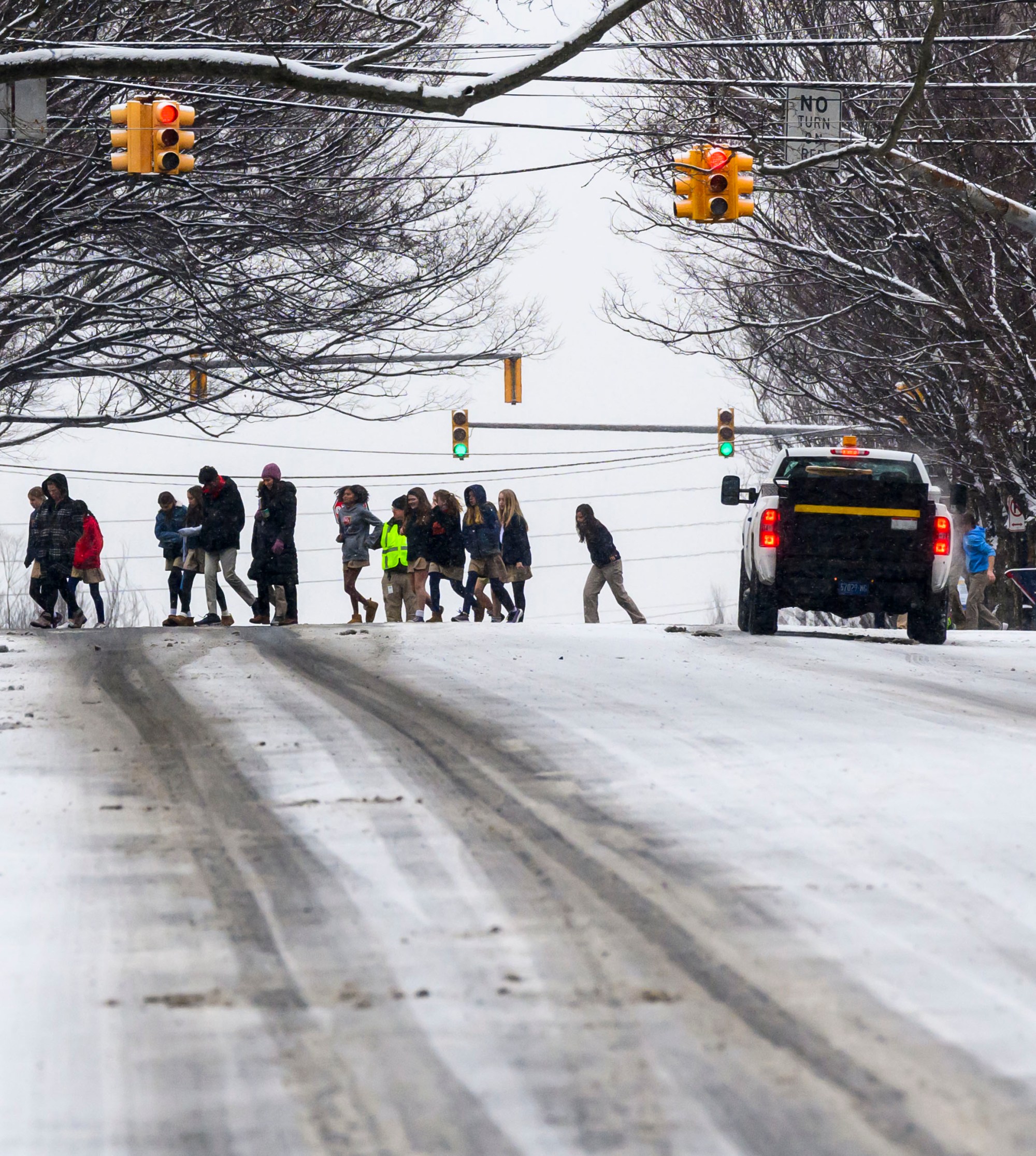 People cross the street through the snow Monday, Jan. 6, 2025, in Bethlehem.(April Gamiz/The Morning Call)