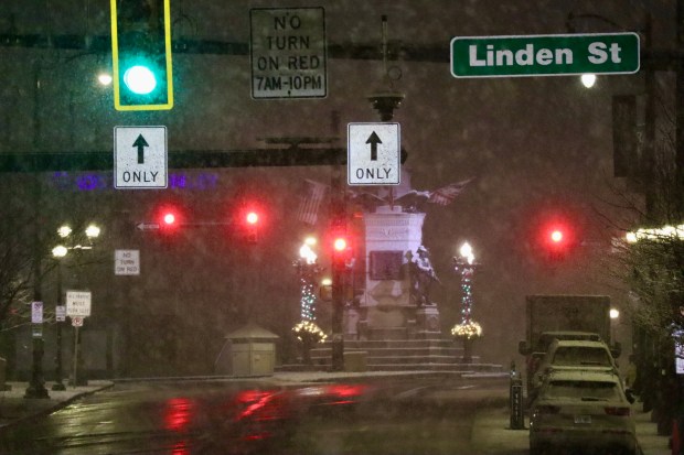 Snow falls over Allentown as winter storm drops 2-4 inches of snow across the Lehigh Valley on Saturday night into Sunday morning Dec. 14, 2025, with cold temperatures and slick roads. (Rich Rolen/Special to The Morning Call)