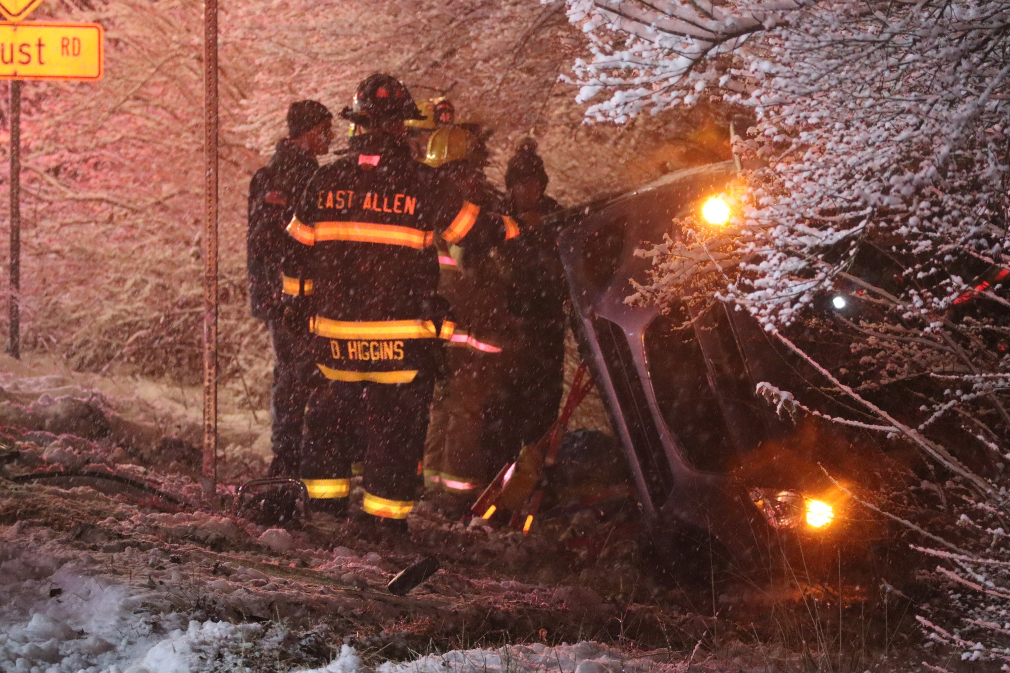 Emergency crews tend to a vehicle rollover in East Allen Township as a winter storm drops 2-4 inches of snow across the Lehigh Valley on Saturday night into Sunday morning Dec. 14, 2025, with cold temperatures and slick roads. (Rich Rolen/Special to The Morning Call)