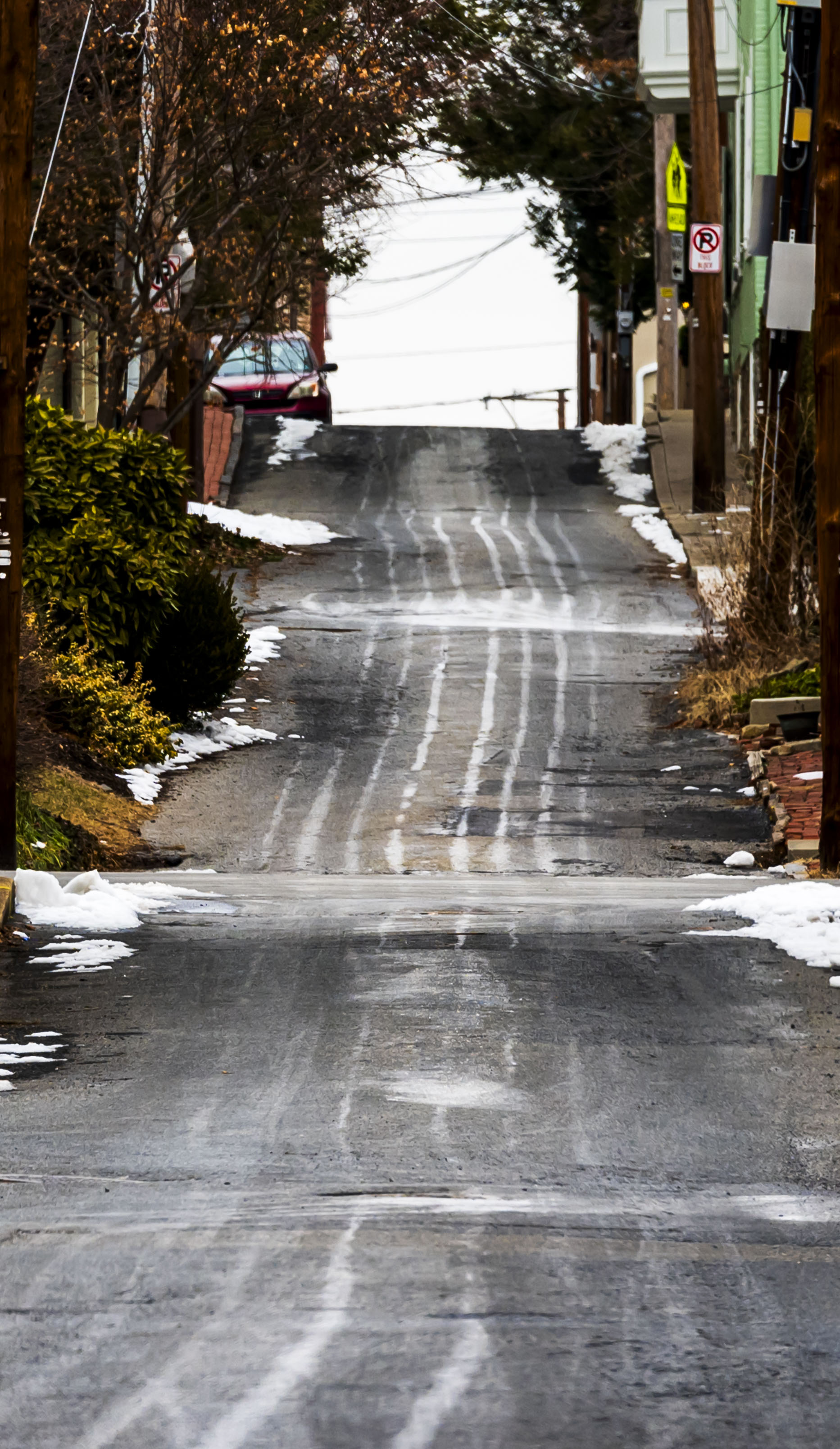 Lines of salt brine are seen on the roads Tuesday, Feb. 11, 2025, in Bethlehem.(April Gamiz/The Morning Call)