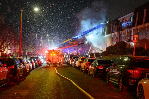 Firefighters respond to a fire Saturday evening Dec. 13, 2025, at the Fairmont Place Apartments on Maryland Circle in Whitehall Township. (Scott M. Nagy/Special to The Morning Call)