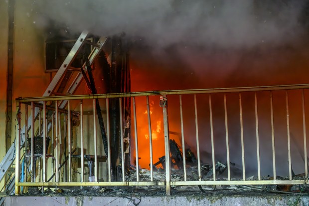 Firefighters respond to a fire Saturday evening Dec. 13, 2025, at the Fairmont Place Apartments on Maryland Circle in Whitehall Township. (Scott M. Nagy/Special to The Morning Call)