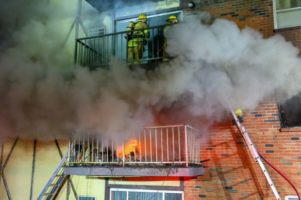 Firefighters respond to a fire Saturday evening Dec. 13, 2025, at the Fairmont Place Apartments on Maryland Circle in Whitehall Township. (Scott M. Nagy/Special to The Morning Call)