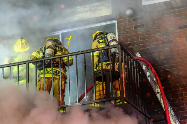 Firefighters respond to a fire Saturday evening Dec. 13, 2025, at the Fairmont Place Apartments on Maryland Circle in Whitehall Township. (Scott M. Nagy/Special to The Morning Call)