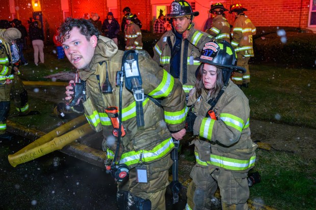 Firefighters respond to a fire Saturday evening Dec. 13, 2025, at the Fairmont Place Apartments on Maryland Circle in Whitehall Township. (Scott M. Nagy/Special to The Morning Call)