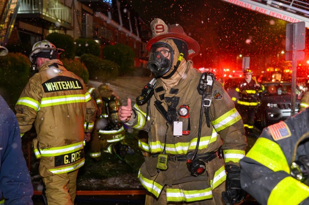 Firefighters respond to a fire Saturday evening Dec. 13, 2025, at the Fairmont Place Apartments on Maryland Circle in Whitehall Township. (Scott M. Nagy/Special to The Morning Call)