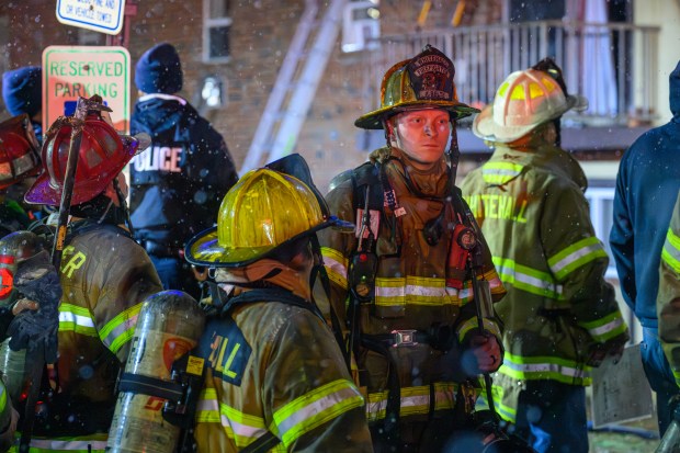 Firefighters respond to a fire Saturday evening Dec. 13, 2025, at the Fairmont Place Apartments on Maryland Circle in Whitehall Township. (Scott M. Nagy/Special to The Morning Call)