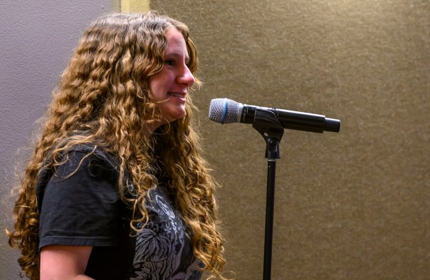 Julie Wright, '26, past president of Lehigh College of Democrats asks U.S. Sen. Dave McCormick, R-Pa., a question on Thursday, Dec. 4, 2025, during Lehigh University's Compelling Perspectives program at the school's Packard Laboratory Room in Bethlehem. (April Gamiz/The Morning Call)