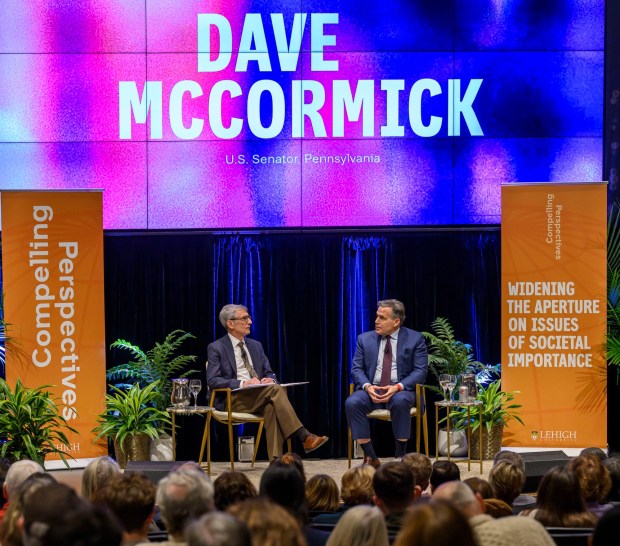 U.S. Sen. Dave McCormick, R-Pa., discusses the government's role in supporting artificial intelligence and innovation with Lehigh University President Joseph J. Helble on Thursday, Dec. 4, 2025, during Lehigh University's Compelling Perspectives program at the school's Packard Laboratory Room in Bethlehem. (April Gamiz/The Morning Call)