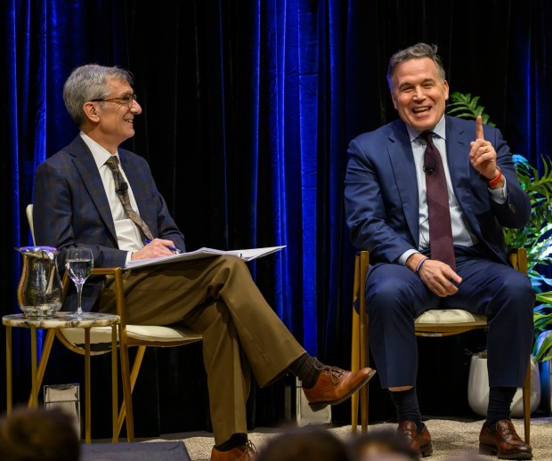 U.S. Sen. Dave McCormick, R-Pa., discusses the government's role in supporting artificial intelligence and innovation with Lehigh University President Joseph J. Helble on Thursday, Dec. 4, 2025, during Lehigh University's Compelling Perspectives program at the school's Packard Laboratory Room in Bethlehem. (April Gamiz/The Morning Call)