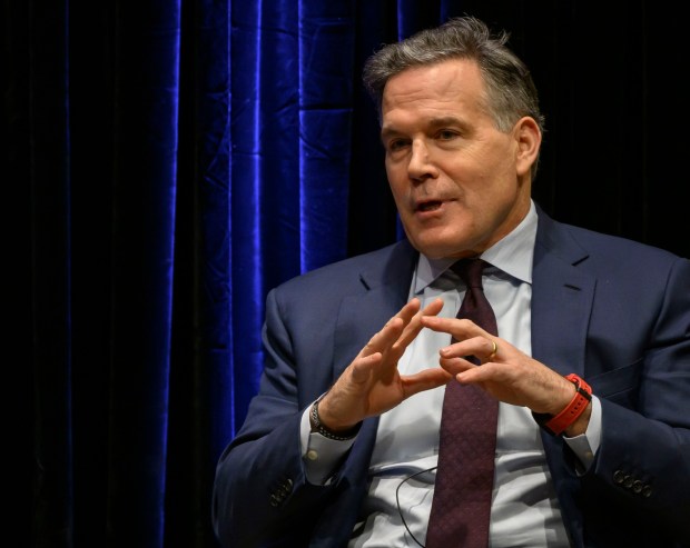 U.S. Sen. Dave McCormick, R-Pa., discusses the government's role in supporting artificial intelligence and innovation with Lehigh University President Joseph J. Helble on Thursday, Dec. 4, 2025, during Lehigh University's Compelling Perspectives program at the school's Packard Laboratory Room in Bethlehem. (April Gamiz/The Morning Call)