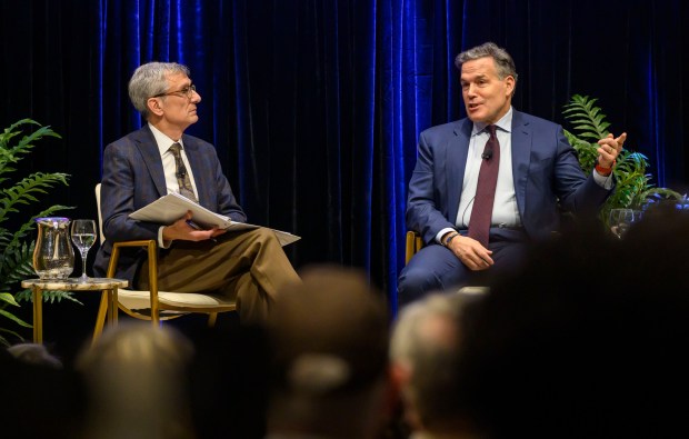 U.S. Sen. Dave McCormick, R-Pa., discusses the government's role in supporting artificial intelligence and innovation with Lehigh University President Joseph J. Helble on Thursday, Dec. 4, 2025, during Lehigh University's Compelling Perspectives program at the school's Packard Laboratory Room in Bethlehem. (April Gamiz/The Morning Call)