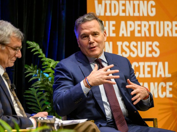 U.S. Sen. Dave McCormick, R-Pa., discusses the government's role in supporting artificial intelligence and innovation with Lehigh University President Joseph J. Helble on Thursday, Dec. 4, 2025, during Lehigh University's Compelling Perspectives program at the school's Packard Laboratory Room in Bethlehem. (April Gamiz/The Morning Call)