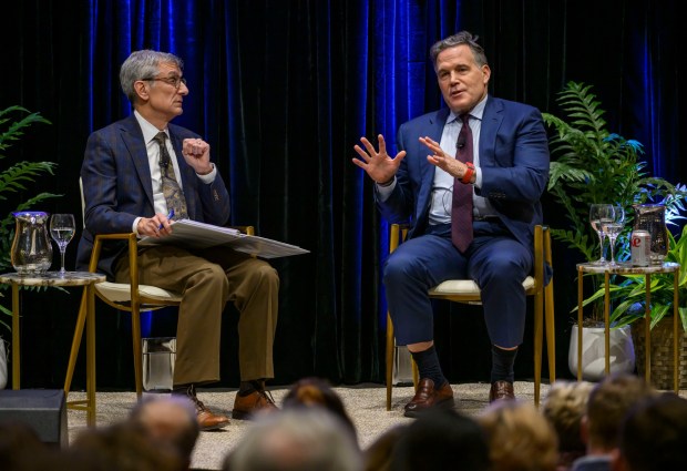 U.S. Sen. Dave McCormick, R-Pa., discusses the government's role in supporting artificial intelligence and innovation with Lehigh University President Joseph J. Helble on Thursday, Dec. 4, 2025, during Lehigh University's Compelling Perspectives program at the school's Packard Laboratory Room in Bethlehem. (April Gamiz/The Morning Call)