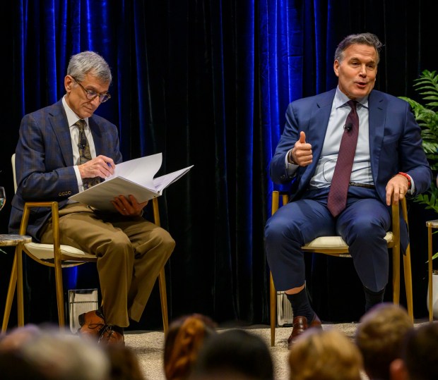 U.S. Sen. Dave McCormick, R-Pa., discusses the government's role in supporting artificial intelligence and innovation with Lehigh University President Joseph J. Helble on Thursday, Dec. 4, 2025, during Lehigh University's Compelling Perspectives program at the school's Packard Laboratory Room in Bethlehem. (April Gamiz/The Morning Call)