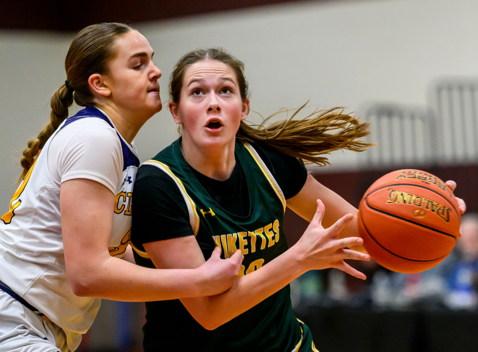 Allentown Central Catholic's Morgan Seagreaves looks to score against Scranton Prep's Chloe Mamera in a PIAA Class 4A girls second-round playoff game Wednesday, March 12, 2025, at Stroudsburg Area High School. (April Gamiz/The Morning Call)