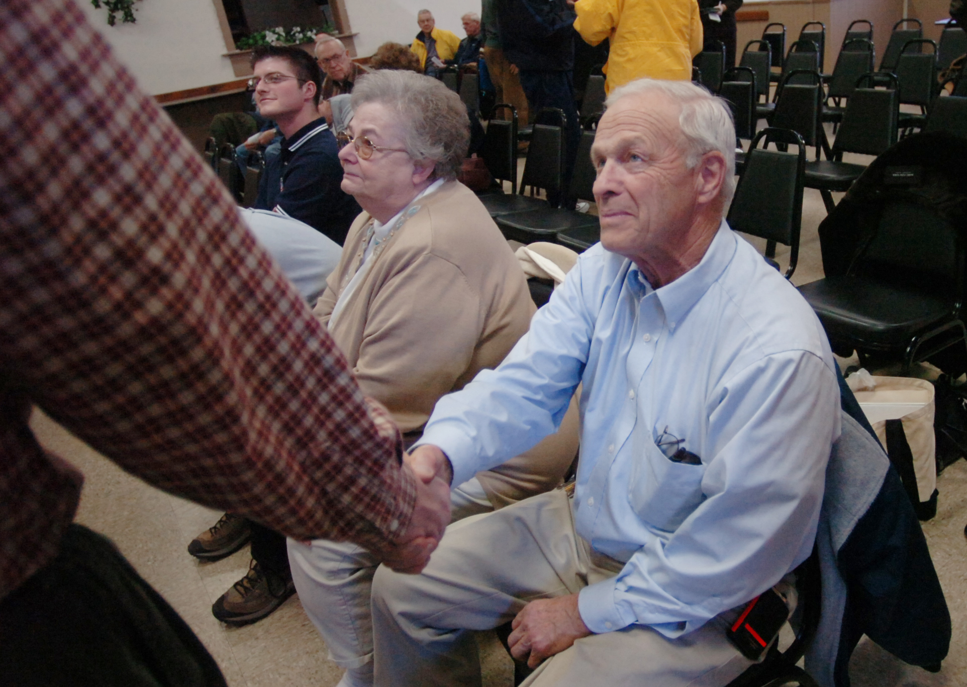 Sitting in the foreground attending the hearing is Ralph Uff,...
