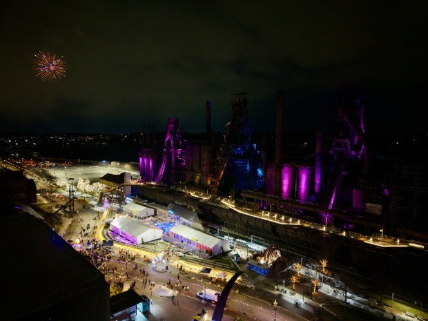 Fireworks light the sky during the first night of PeepsFest on Tuesday, Dec. 30, 2025, at SteelStacks in Bethlehem. Revelers braved freezing cold temperatures and high winds to witness the annual Peeps chick drop, which will be done again Wednesday night. (Rich Rolen/Special to The Morning Call)