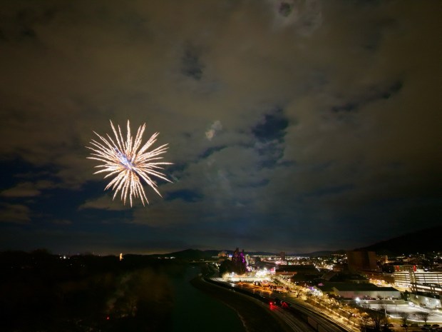 Fireworks light the sky during the first night of PeepsFest on Tuesday, Dec. 30, 2025, at SteelStacks in Bethlehem. Revelers braved freezing cold temperatures and high winds to witness the annual Peeps chick drop, which will be done again Wednesday night. (Rich Rolen/Special to The Morning Call)