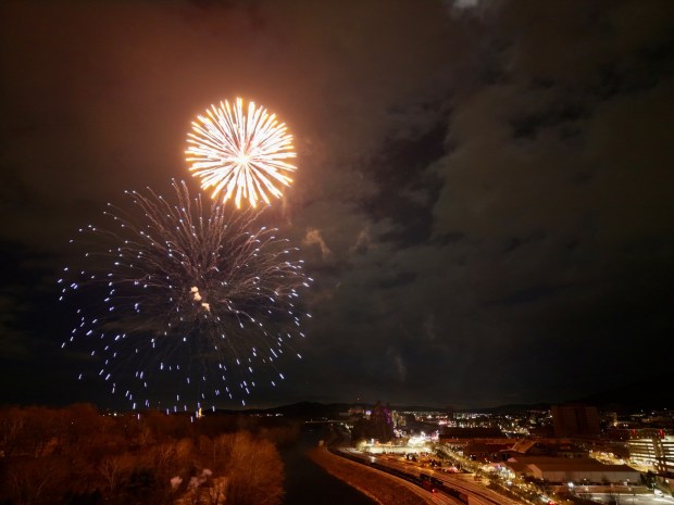 Fireworks light the sky during the first night of PeepsFest on Tuesday, Dec. 30, 2025, at SteelStacks in Bethlehem. Revelers braved freezing cold temperatures and high winds to witness the annual Peeps chick drop, which will be done again Wednesday night. (Rich Rolen/Special to The Morning Call)