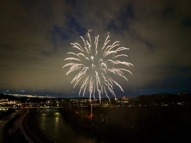 Fireworks light the sky during the first night of PeepsFest on Tuesday, Dec. 30, 2025, at SteelStacks in Bethlehem. Revelers braved freezing cold temperatures and high winds to witness the annual Peeps chick drop, which will be done again Wednesday night. (Rich Rolen/Special to The Morning Call)