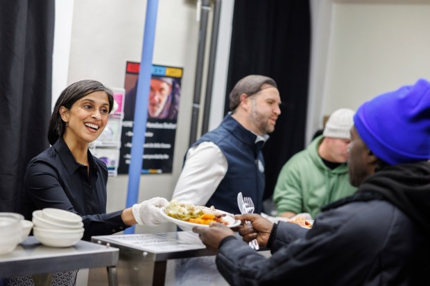 Vice President JD Vance and second lady Usha Vance serve food to attendees at the Allentown Rescue Mission in Allentown on Tuesday, Dec. 16, 2025. (Tom Brenner/The New York Times via AP, Pool)