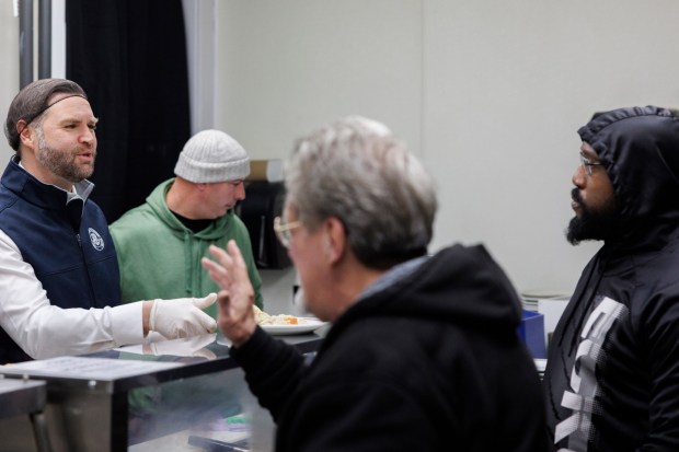 Vice President JD Vance and second lady Usha Vance share a meal with individuals in recovery at the Allentown Rescue Mission in Allentown on Tuesday, Dec. 16, 2025. (Tom Brenner/The New York Times via AP, Pool)