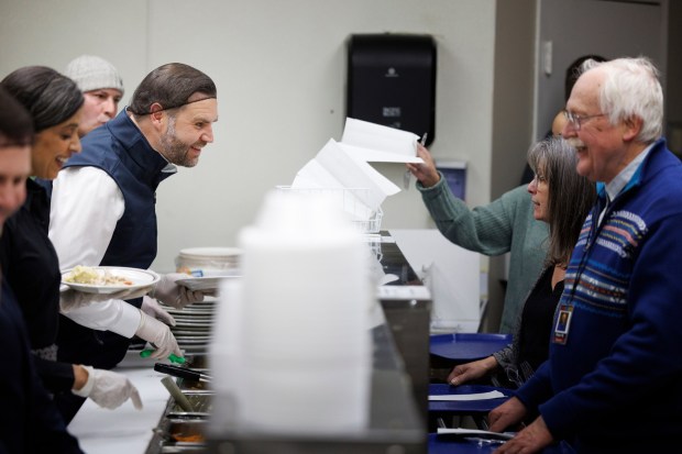 Vice President JD Vance and second lady Usha Vance share a meal with individuals in recovery at the Allentown Rescue Mission in Allentown on Tuesday, Dec. 16, 2025. (Tom Brenner/The New York Times via AP, Pool)