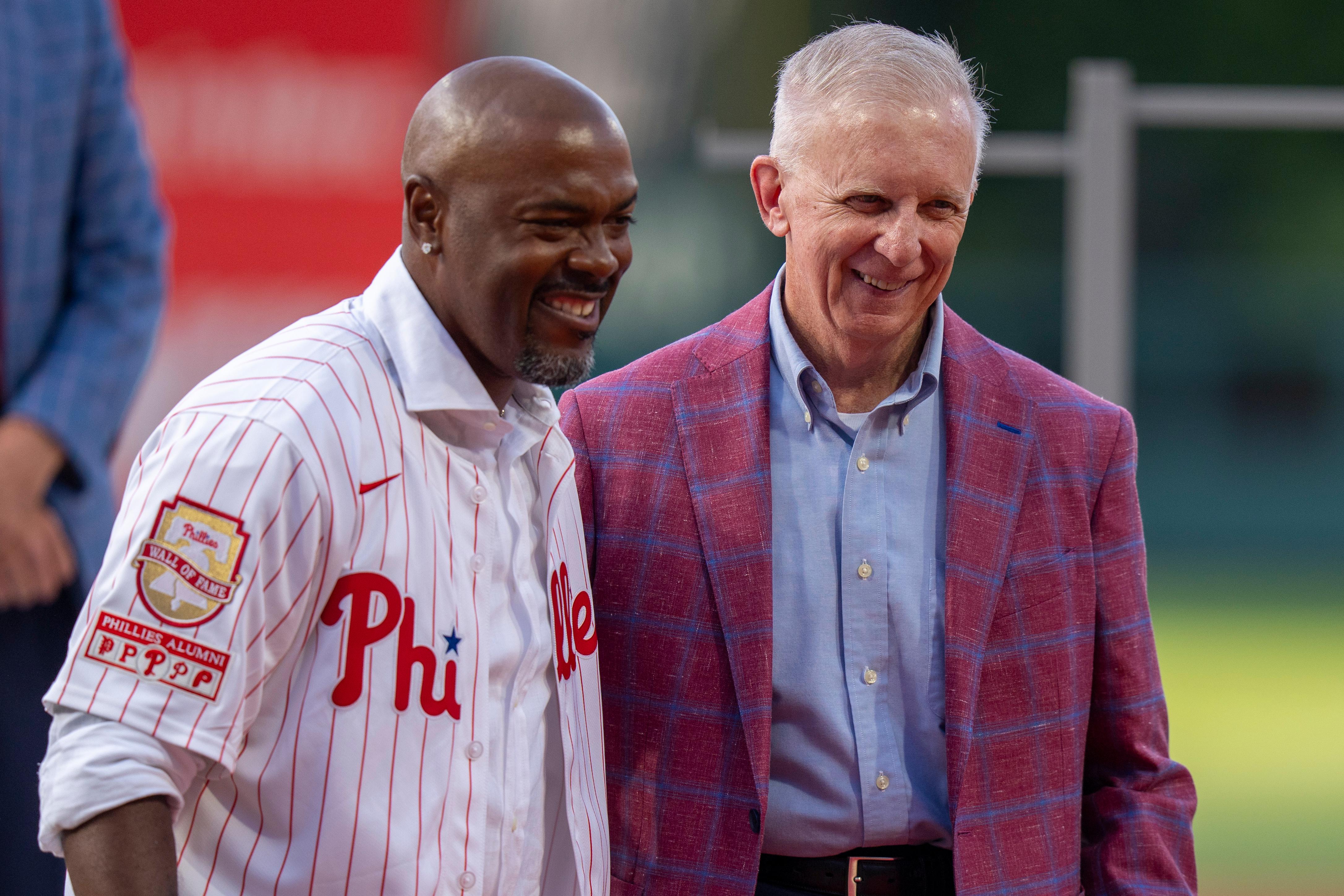 Former Philadelphia Phillies’ Jimmy Rollins, left, and Ed Wade, right,...