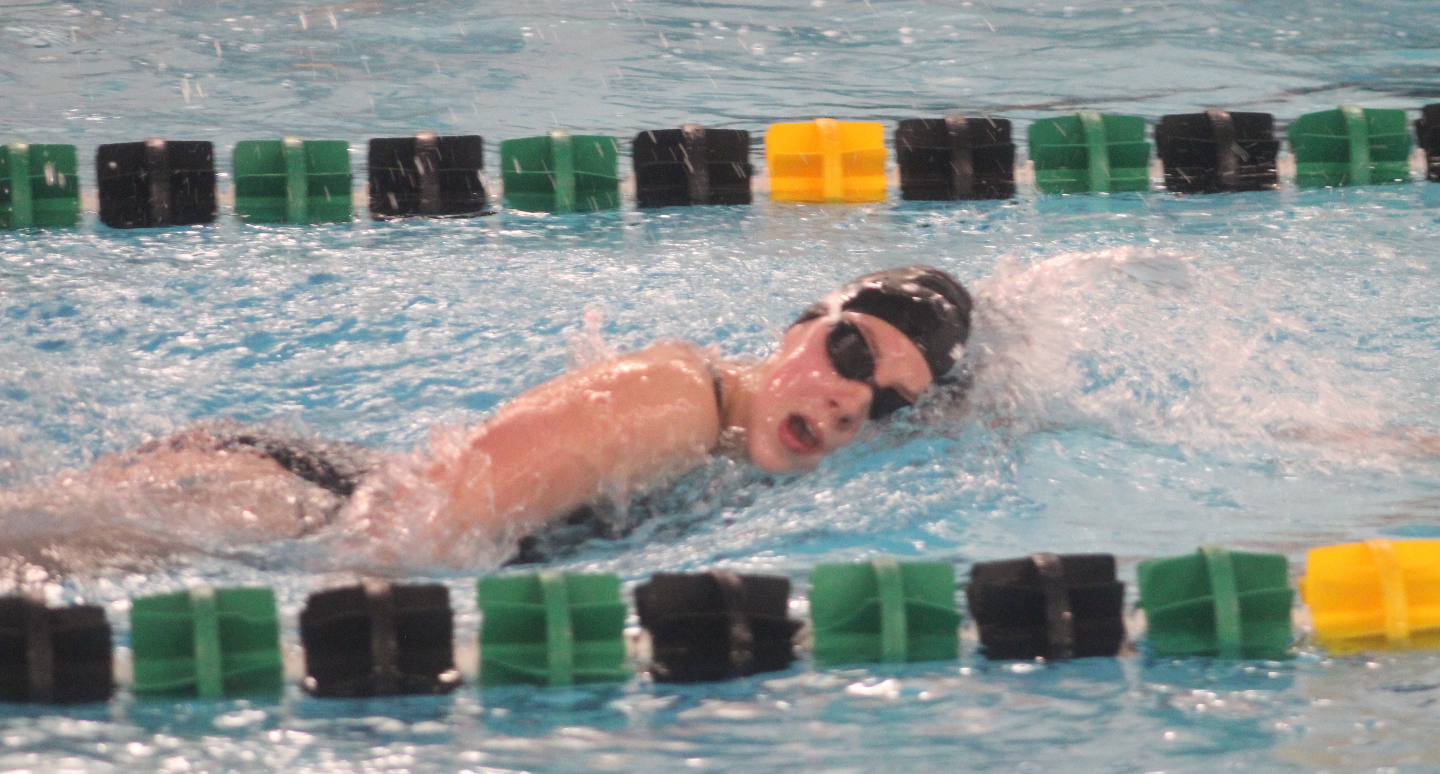 Elk Lake’s Hannah Howell swims the 200-yard freestyle during a...