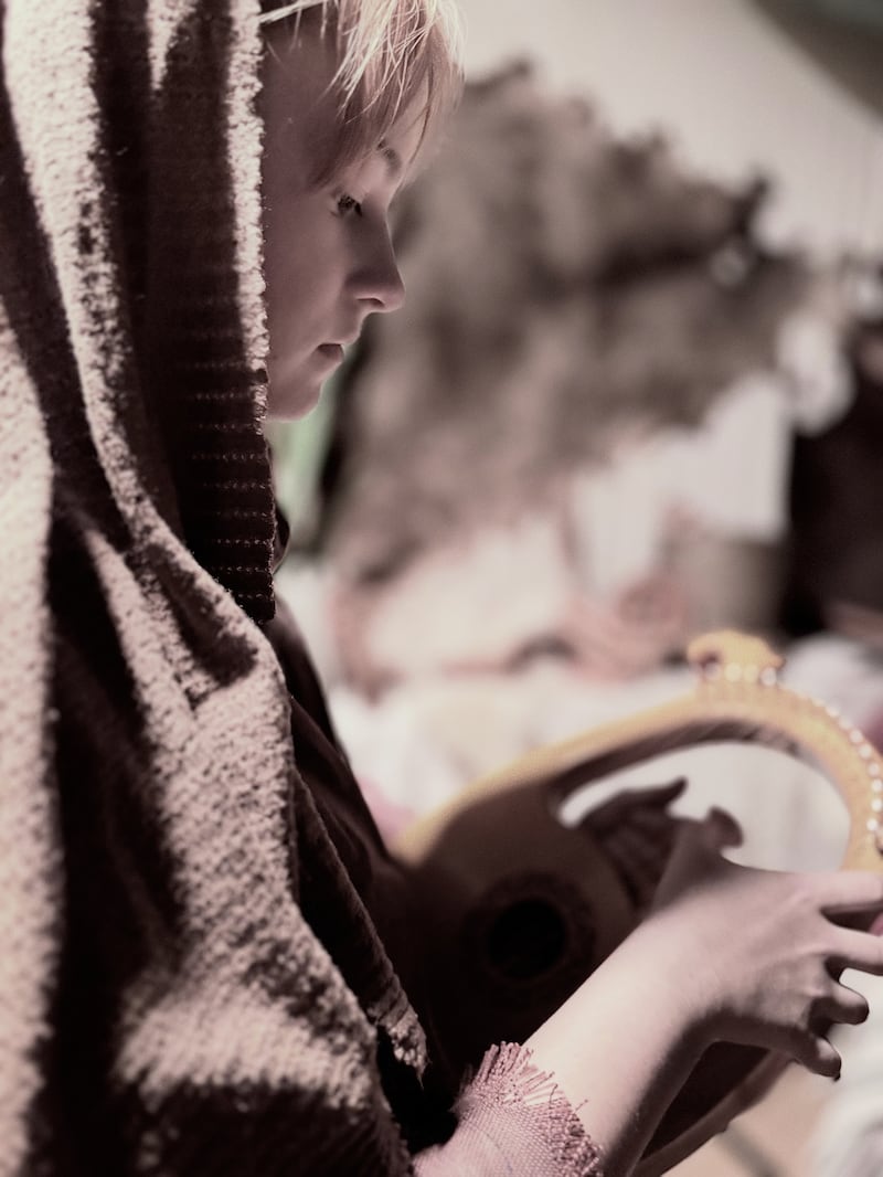A young volunteer in period clothing takes part in the Bethlehem Walk of Escondido, which ran Dec. 12-14, 2025, at the Escondido California Stake Center.