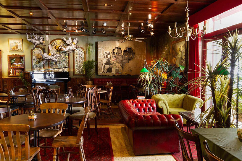 banksy's 'walled off hotel' reopens in bethlehem after two-year closure