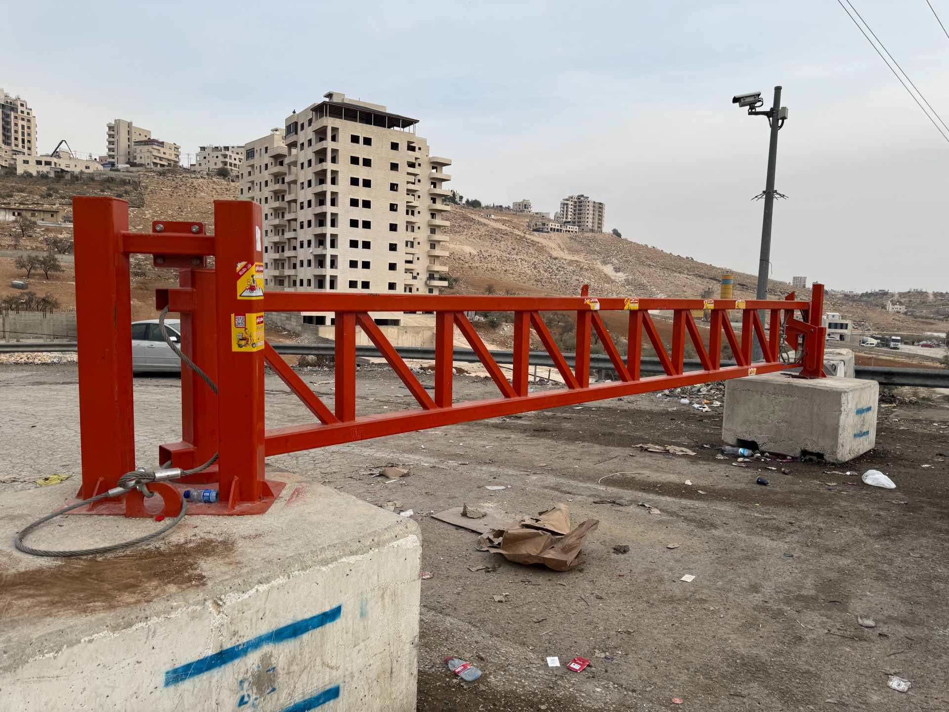 An Israeli military gate blocks the road connecting the village of Dar Salah to Bethlehem (MEE) 