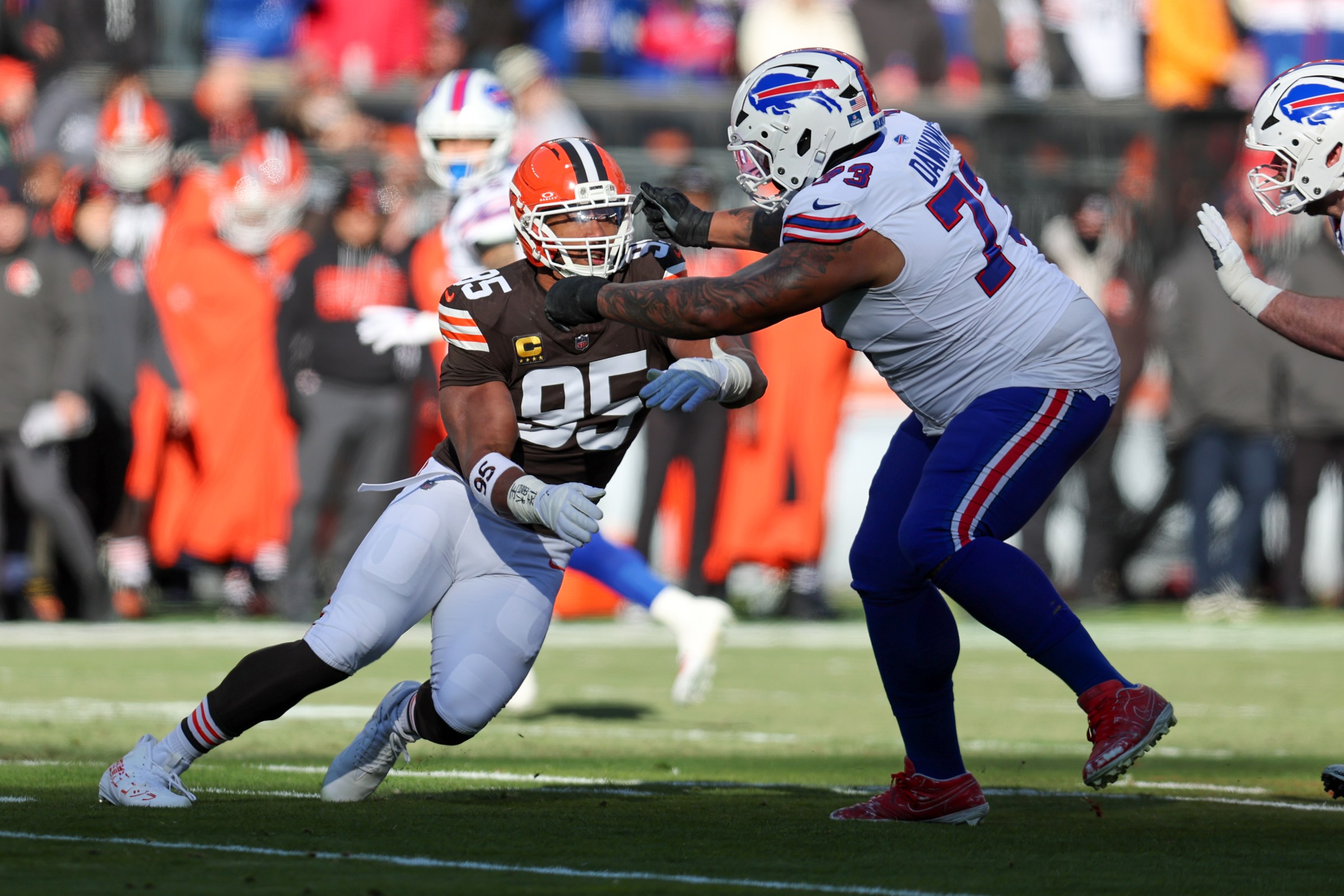CLEVELAND, OH - DECEMBER 21: Buffalo Bills offensive tackle Dion Dawkins (73) blocks Cleveland Browns defensive end Myles Garrett (95) during the first quarter of the National Football League game between the Buffalo Bills and Cleveland Browns on December 21, 2025, at Huntington Bank Field in Cleveland, OH. (Photo by Frank Jansky/Icon Sportswire via Getty Images)
