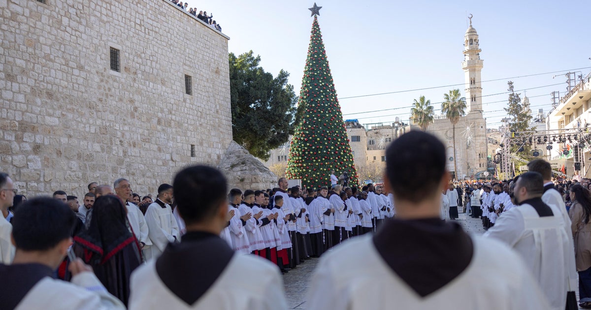 Thousands attend Christmas tree lighting ceremony in Bethlehem, the first since war in Gaza began
